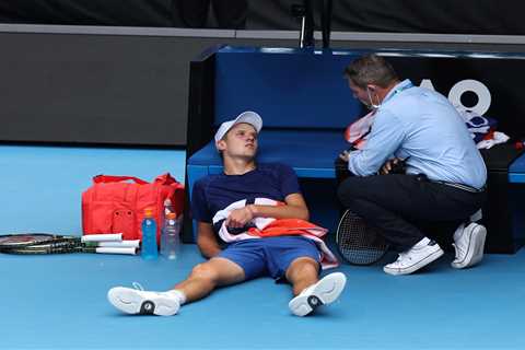 Watch worst attack of cramp ever as Mensik, 16, collapses on court and is forced off in wheelchair..