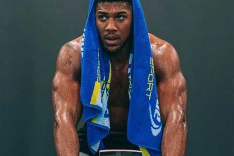 Anthony Joshua blasted for ‘staged photo shoot’ and ‘spraying water on himself’ by former UFC star..