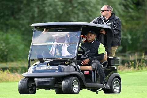 Tiger Woods a huge doubt for The Open as hobbling legend forced to use golf buggy between shots at..