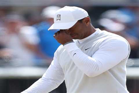 Tiger Woods in tears on 18th hole and admits he may never play St Andrews again as be battles on..