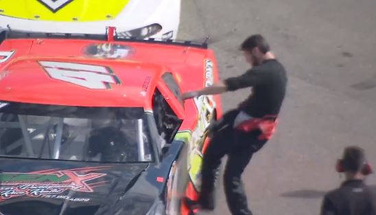 Watch furious driver repeatedly punch rival through the car window as angry row in NASCAR race turns violent