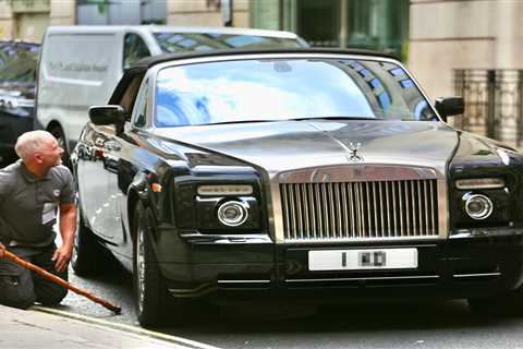 Chris Eubank repeatedly DRIVES OVER his own designer bag while parking £300k Rolls Royce and gets..