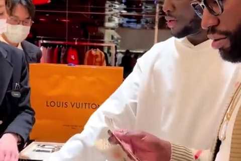 Billionaire Floyd Mayweather has his own money counter to help him during spending spree at Louis..