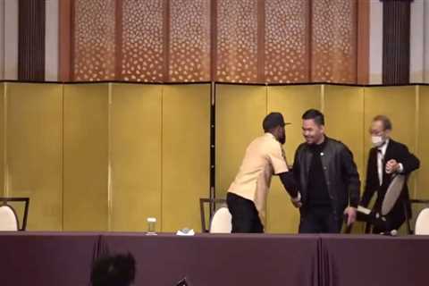 Floyd Mayweather and Manny Pacquiao take playful jabs at each other in press conference ahead of..