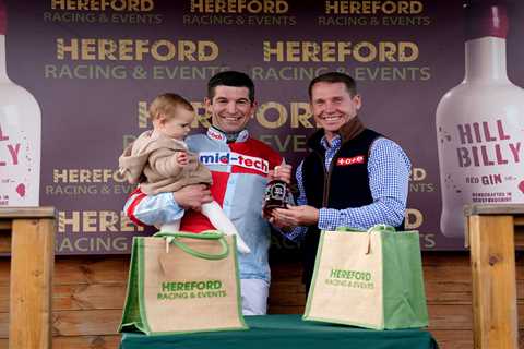 Smiling Robbie Dunne celebrates first winner back after bully ban with baby daughter at Hereford