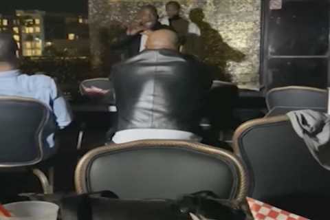 Watch Mike Tyson’s ice-cool reaction after crazed fan pulled out gun having approached him at..