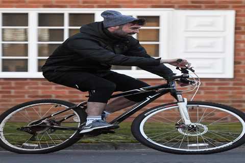 Man Utd Premier League winner looks unrecognisable 15 years later as he rides on a bike outside..