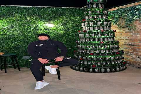 Conor McGregor makes CHRISTMAS TREE out of Proper 12 whiskey bottles as UFC star gets in the..