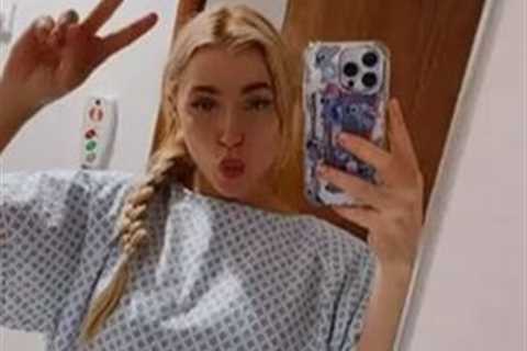 OnlyFans beauty and boxer Elle Brooke pictured in hospital gown in worrying Instagram post