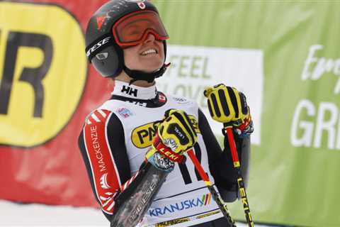 Grenier wins first World Cup race