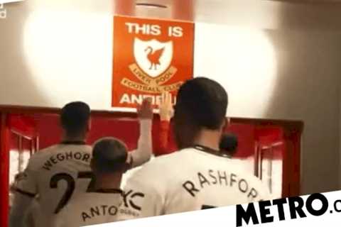 Boyhood Liverpool fan Wout Weghorst slammed for touching ‘This is Anfield’ sign before Manchester..