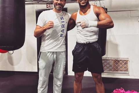 Hulking Anthony Joshua poses with Eddie Hearn as promoter stops off in Texas to watch heavyweight..