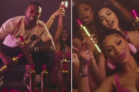 Patrice Evra dances with scantily-clad women in music vid for millionaire ballboy’s vodka