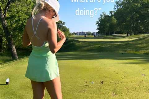 Paige Spiranac checks out her boobs in revealing outfit on golf course leaving friend baffled