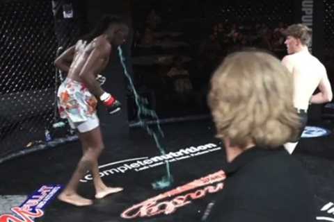 MMA Star Loses Fight After Throwing Up Blue Liquid Mid-Fight